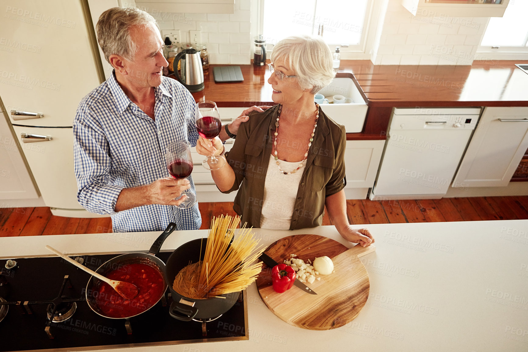 Buy stock photo Top view, wine or happy old couple cooking food for a healthy vegan diet together with love in retirement at home. Senior woman drinking or bonding in house kitchen with mature husband at dinner 