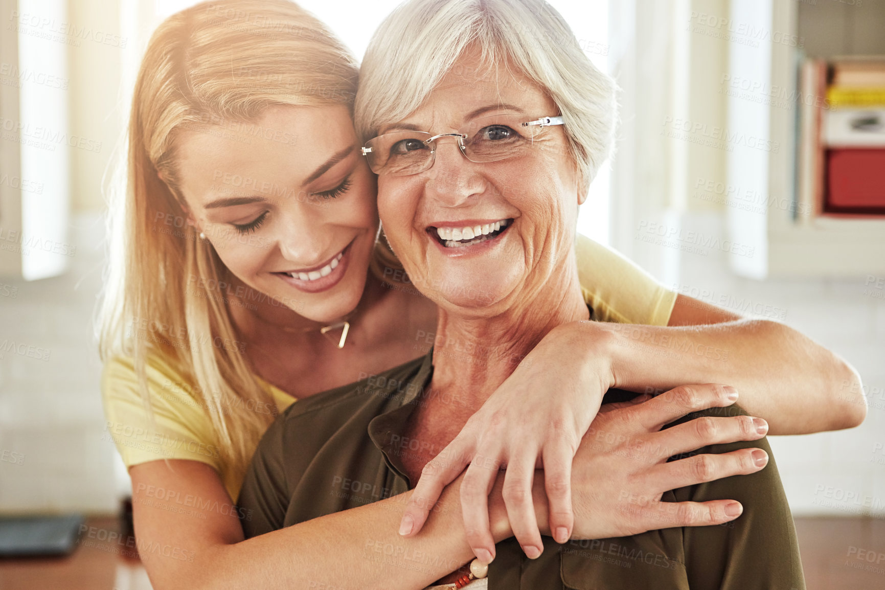Buy stock photo Cropped shot of a senior woman and her adult daughter at home