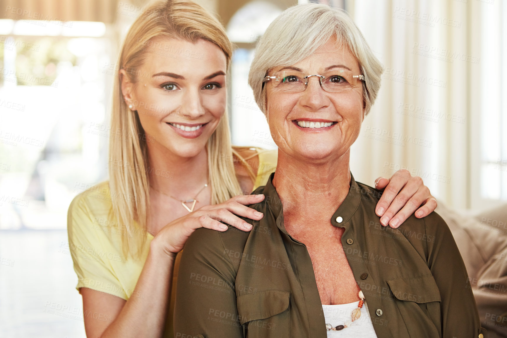 Buy stock photo Cropped portrait of a senior woman and her adult daughter at home