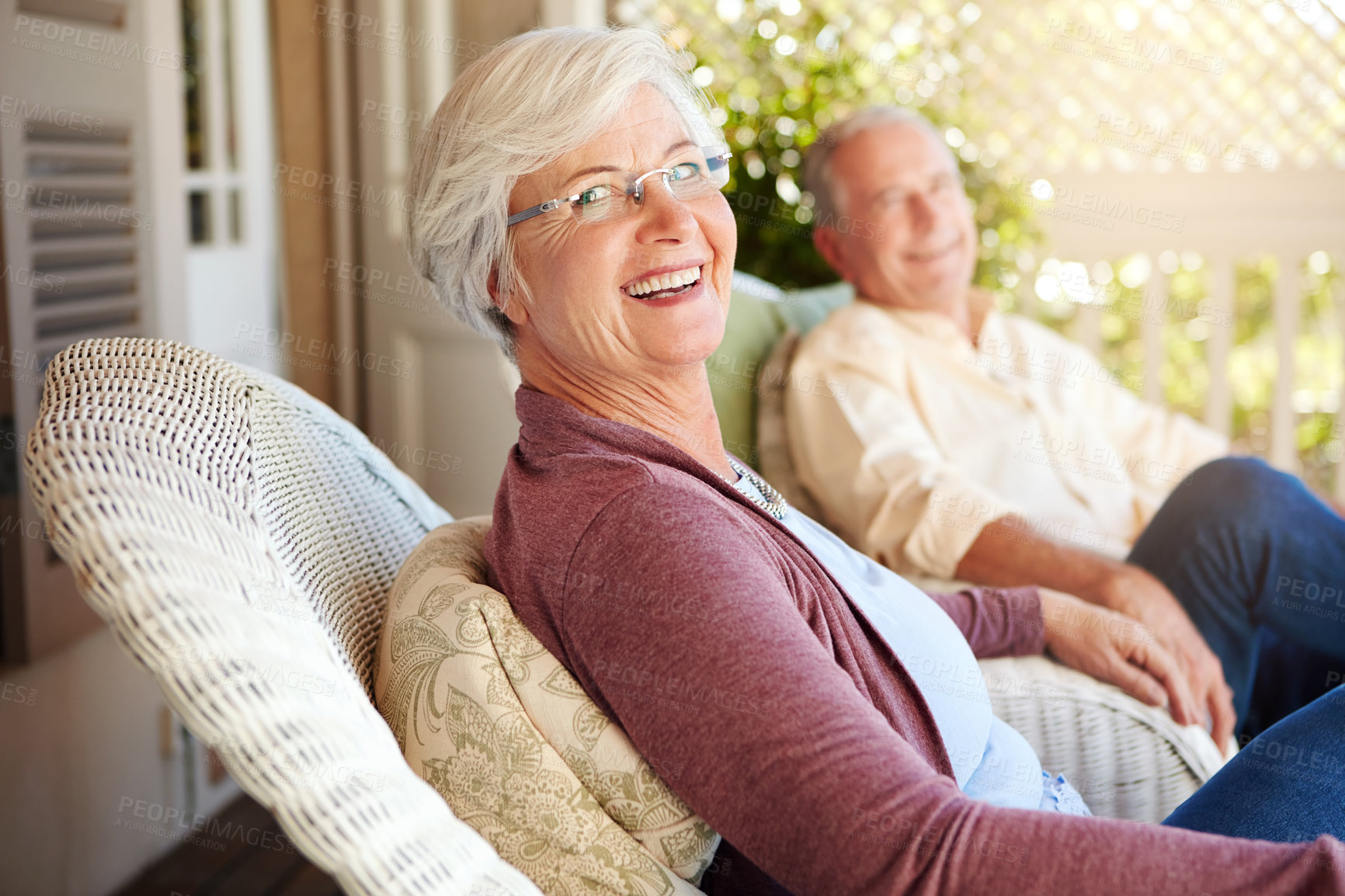 Buy stock photo Cropped portrait of a senior couple sitting outdoors