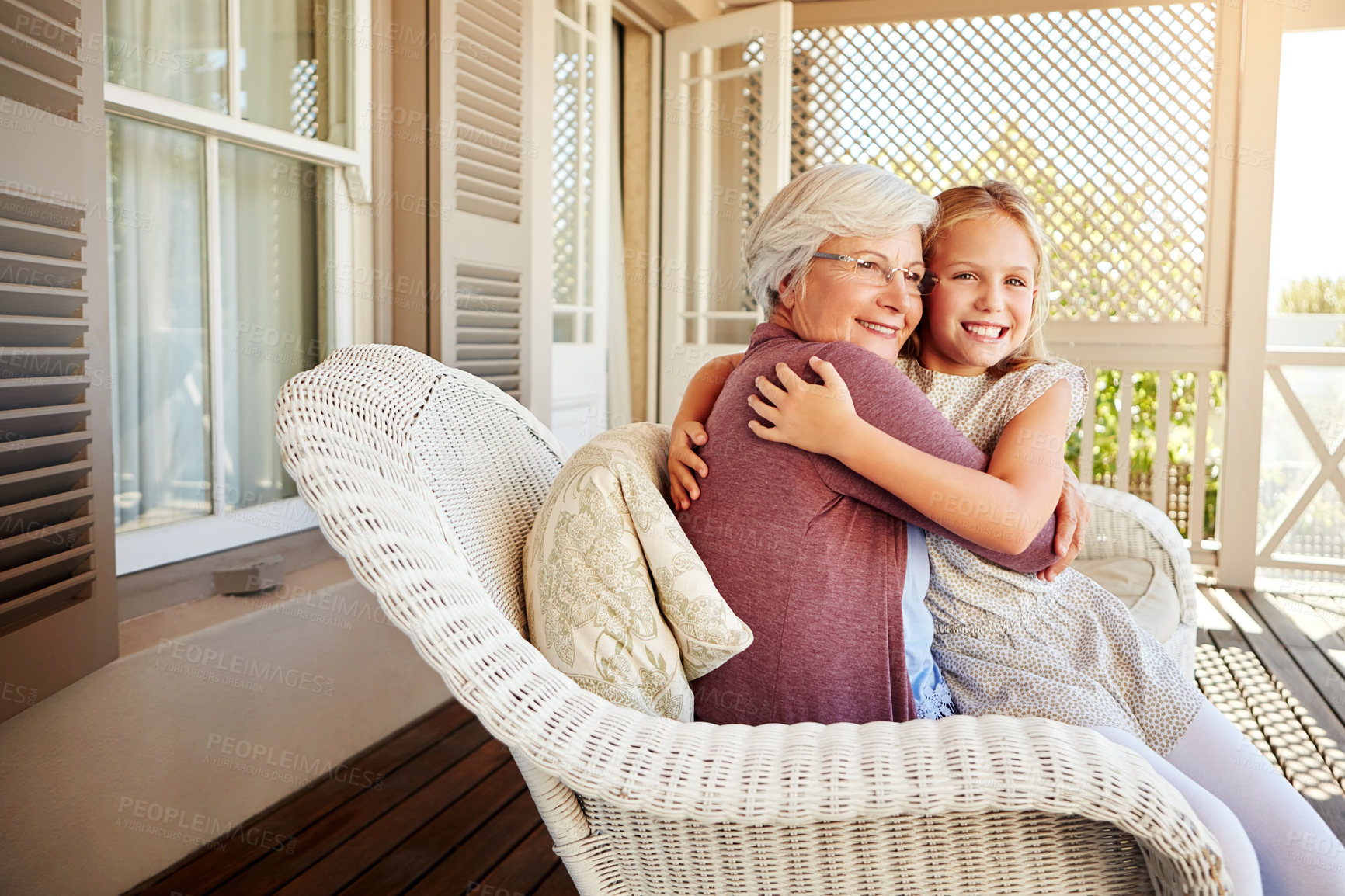 Buy stock photo Girl, grandma and hug by house for love, relax and bonding with support, embrace or happiness. Kid, grandmother and connection as family for generations, babysitting or weekend in Texas with portrait