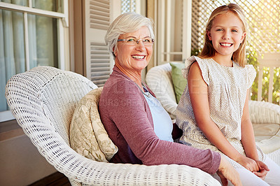 Buy stock photo Girl, grandmother and portrait by house for bonding, relax and love with support, care or happiness. Child, grandma and family with face for relationship, babysitting or comfort on weekend in Germany