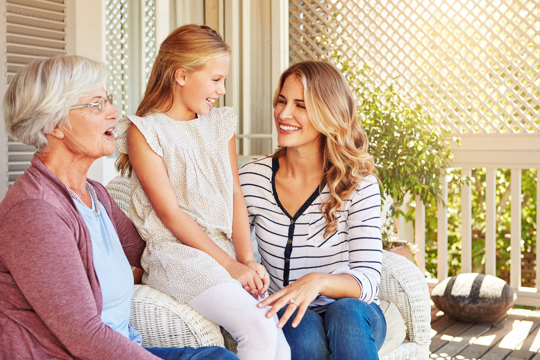 Buy stock photo Mother, girl and grandmother with laughing outdoor by home for funny joke, bonding together and relax. Happy family, generations and people with humor for support, care and love relationship on porch