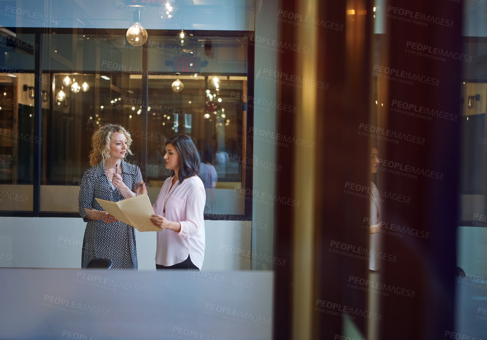Buy stock photo People, meeting and talking with folder in office for real estate, planning and property listing. Women, team and document of client portfolio, review contract and auction information of negotiation