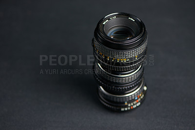 Buy stock photo Studio shot of various camera lenses