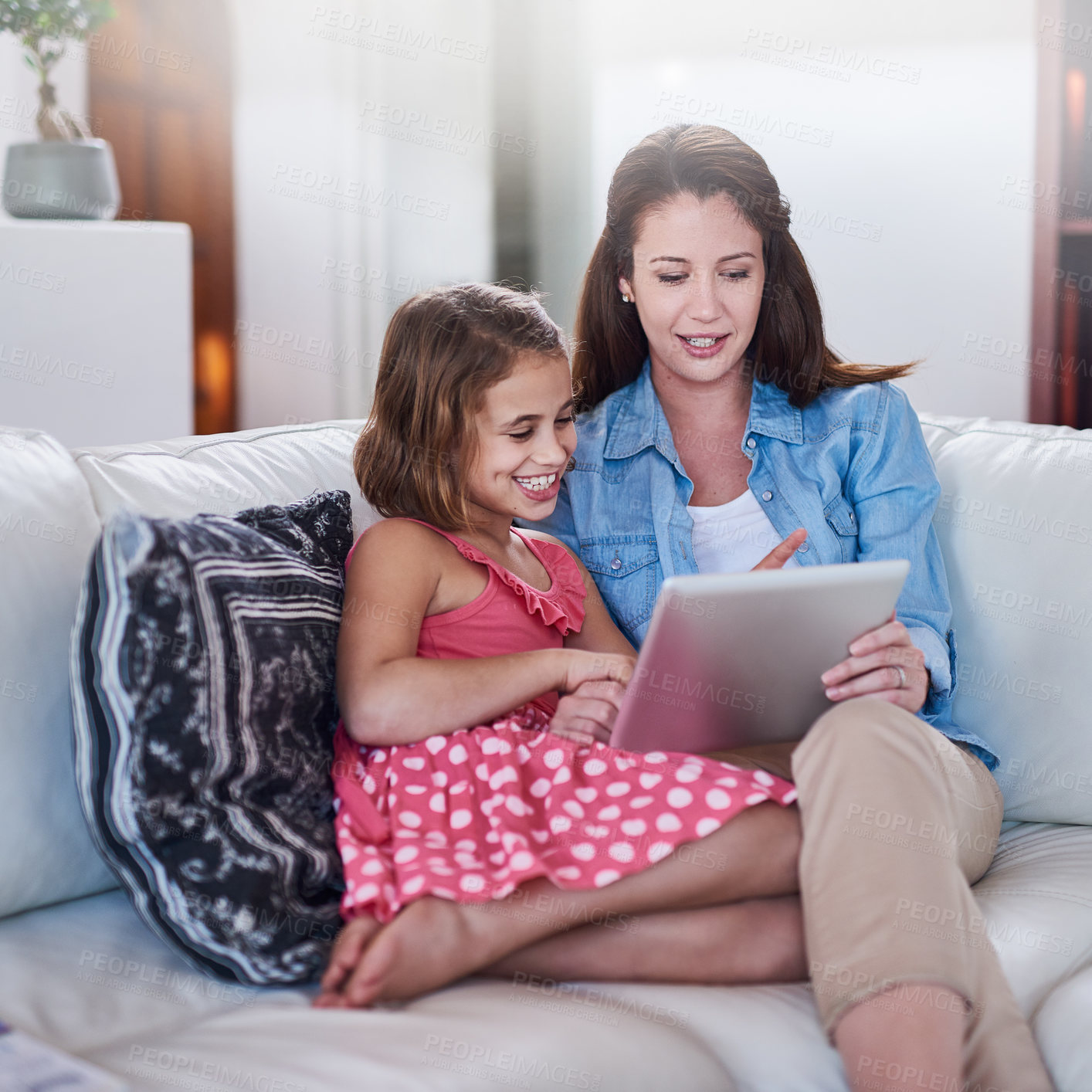 Buy stock photo Mother, girl child and relax with tablet for streaming, elearning or online games with bonding or together at family home. Happy, love and woman on break with daughter, connection and ebook with tech