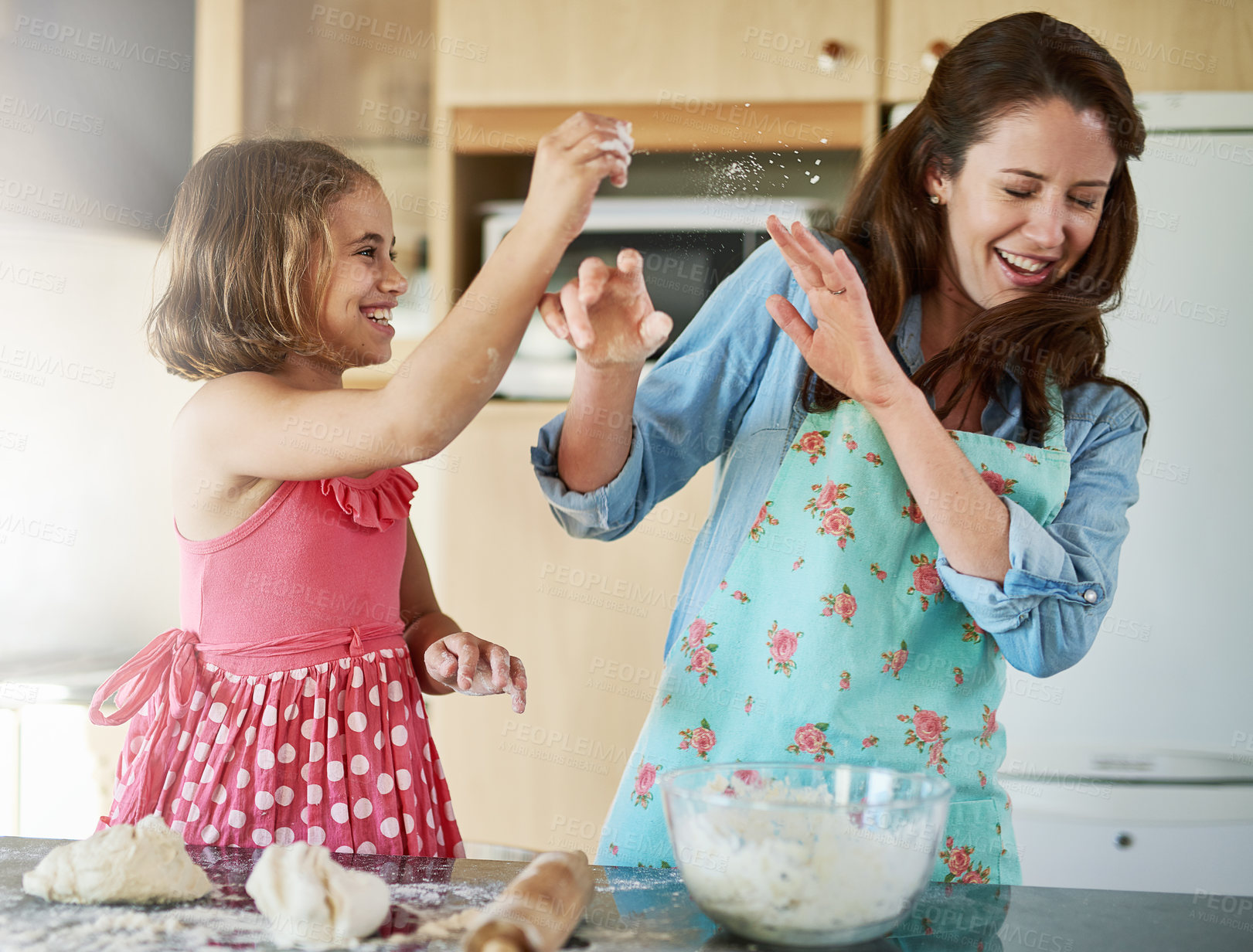 Buy stock photo Mother, child and playful baking with dough for homemade cookies at home, bonding or dessert. Woman, daughter and laughing in kitchen while learning for cooking education or pastry, morning or flour