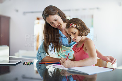Buy stock photo Mother, child and drawing learning in home for art creativity at kitchen counter, development or teaching. Woman, daughter and pencils for colouring lesson together for project, homework or education