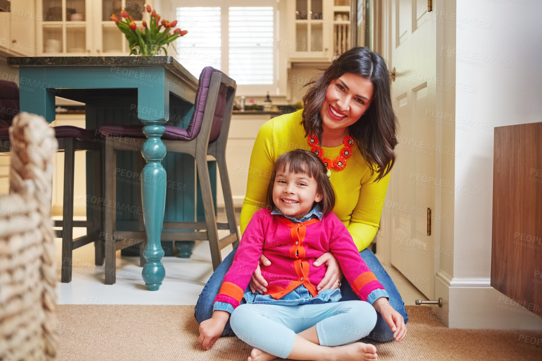 Buy stock photo Portrait of an adorable little girl and her mother bonding at home