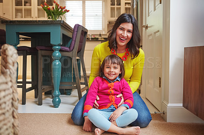 Buy stock photo Portrait of an adorable little girl and her mother bonding at home