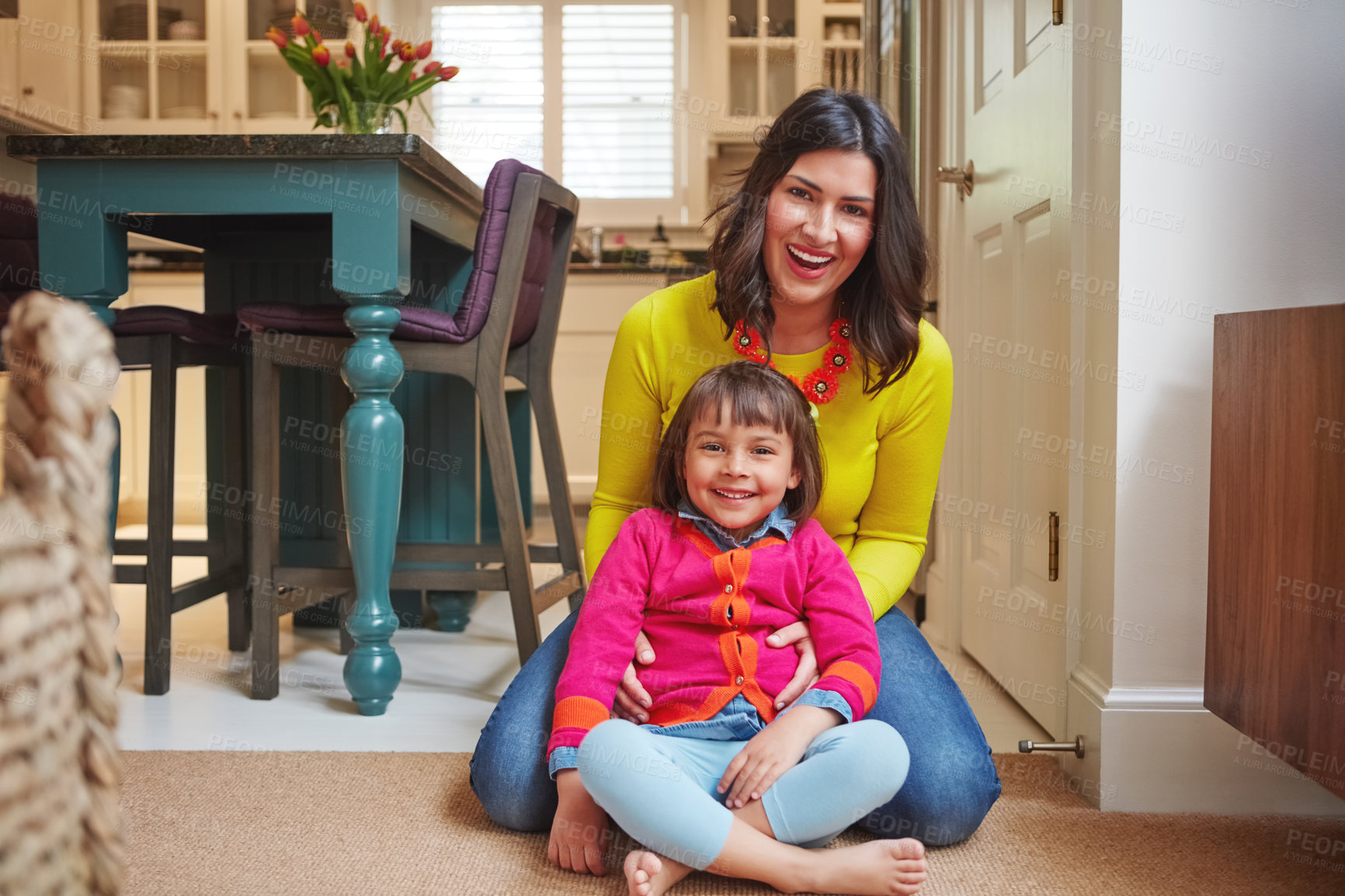 Buy stock photo Portrait of an adorable little girl and her mother bonding at home