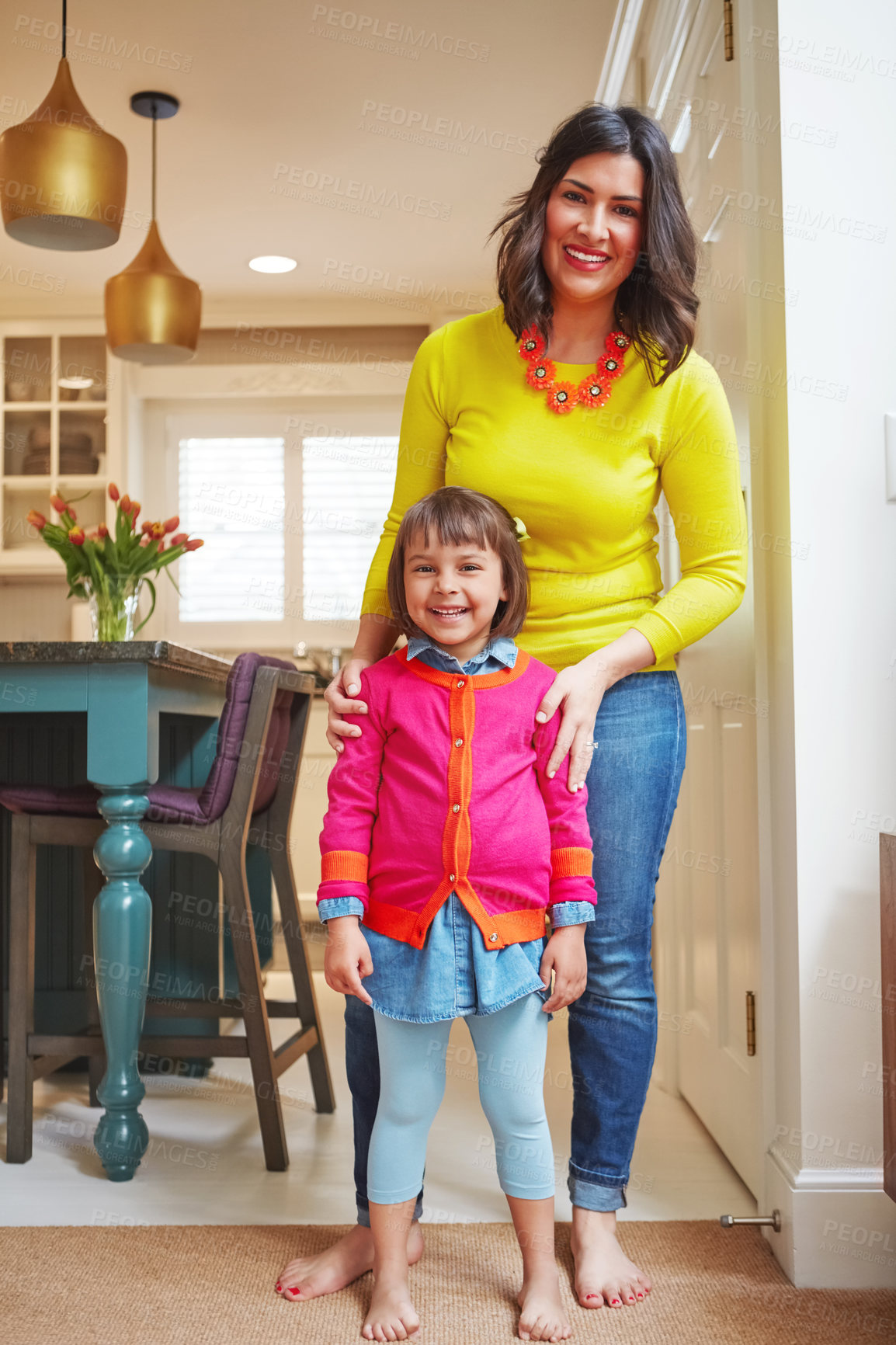 Buy stock photo Portrait of an adorable little girl and her mother bonding at home