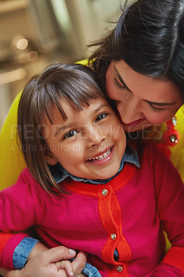 Buy stock photo Portrait of an adorable little girl and her mother bonding at home