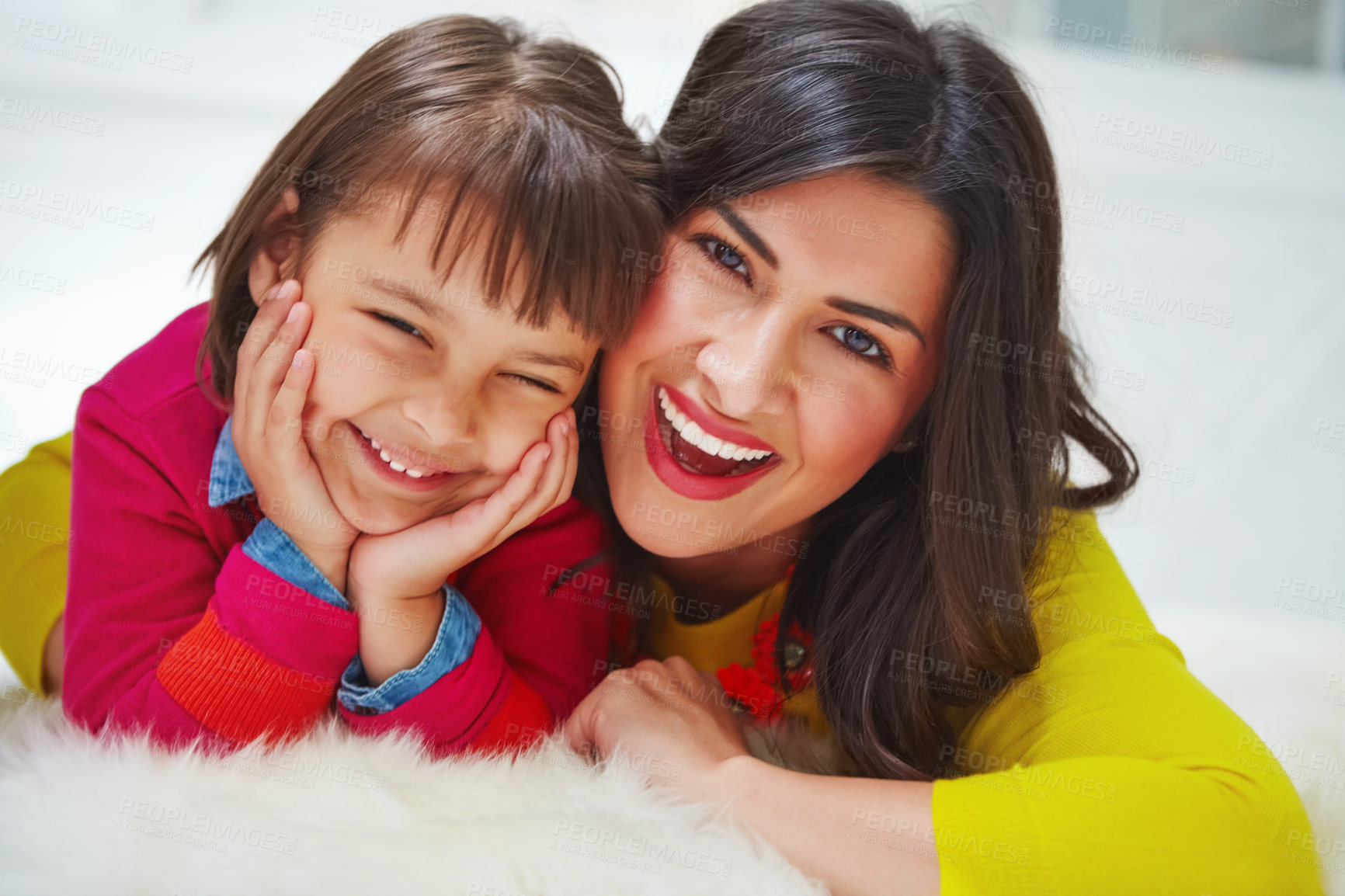 Buy stock photo Portrait of an adorable little girl and her mother bonding at home