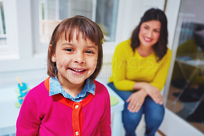 Buy stock photo Portrait of an adorable little girl and her mother at home