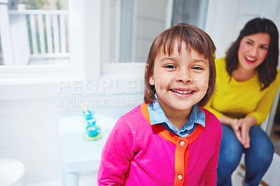 Buy stock photo Portrait of an adorable little girl and her mother at home