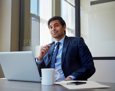 Buy stock photo Cropped shot of a businessman working in his office