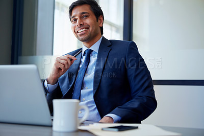 Buy stock photo Cropped shot of a businessman working in his office