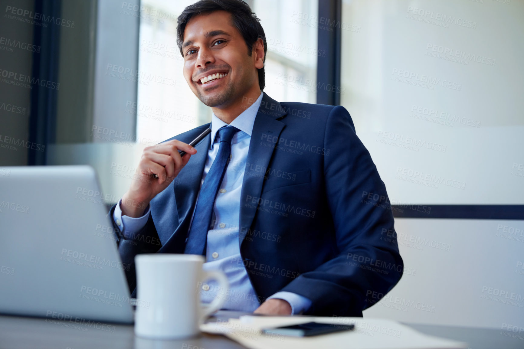 Buy stock photo Cropped shot of a businessman working in his office