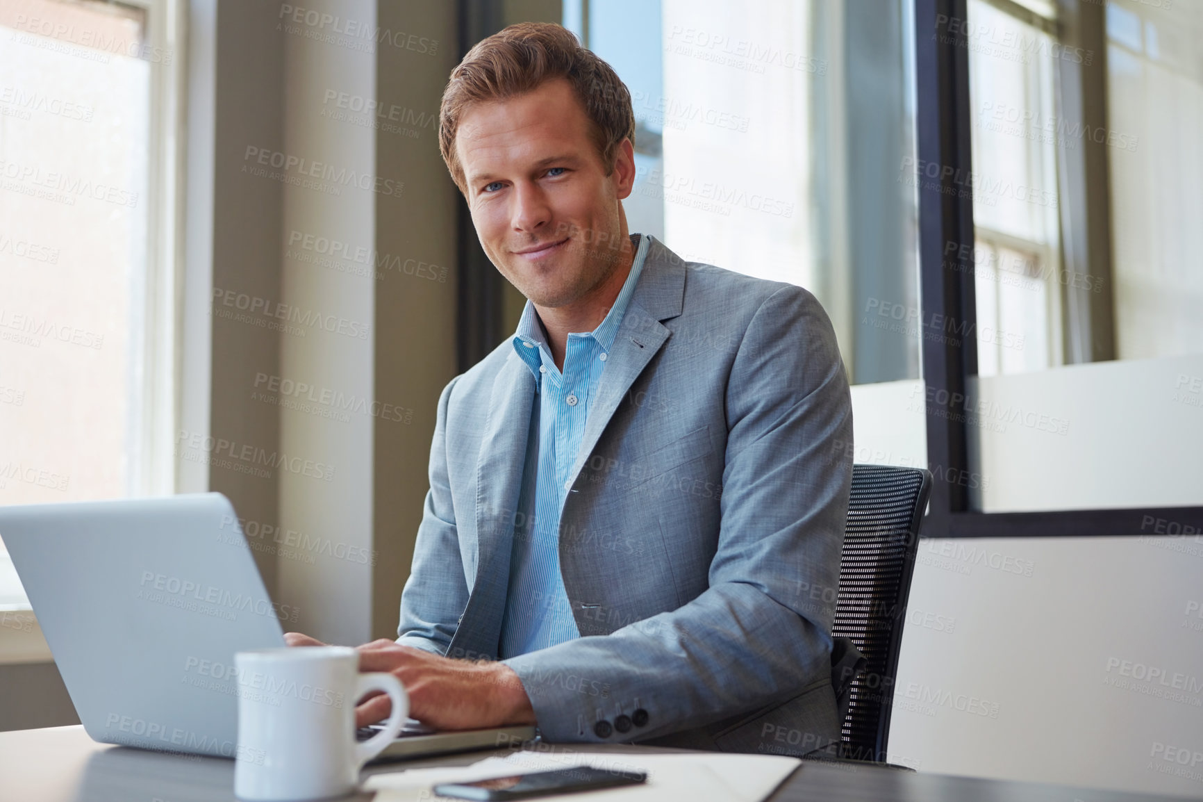 Buy stock photo Cropped portrait of a businessman working in his office