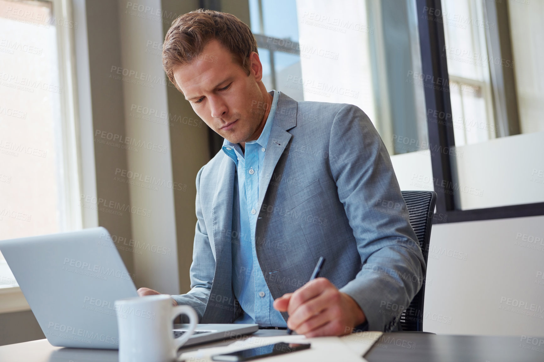 Buy stock photo Laptop, business man and writing in office for financial reporting, policy update or budget summary. Finance manager, tech and notes at corporate firm for company risk management and investment info