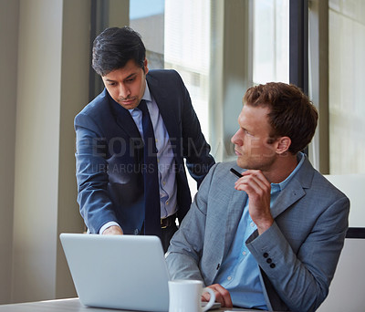 Buy stock photo Cropped shot of businessmen working in their office