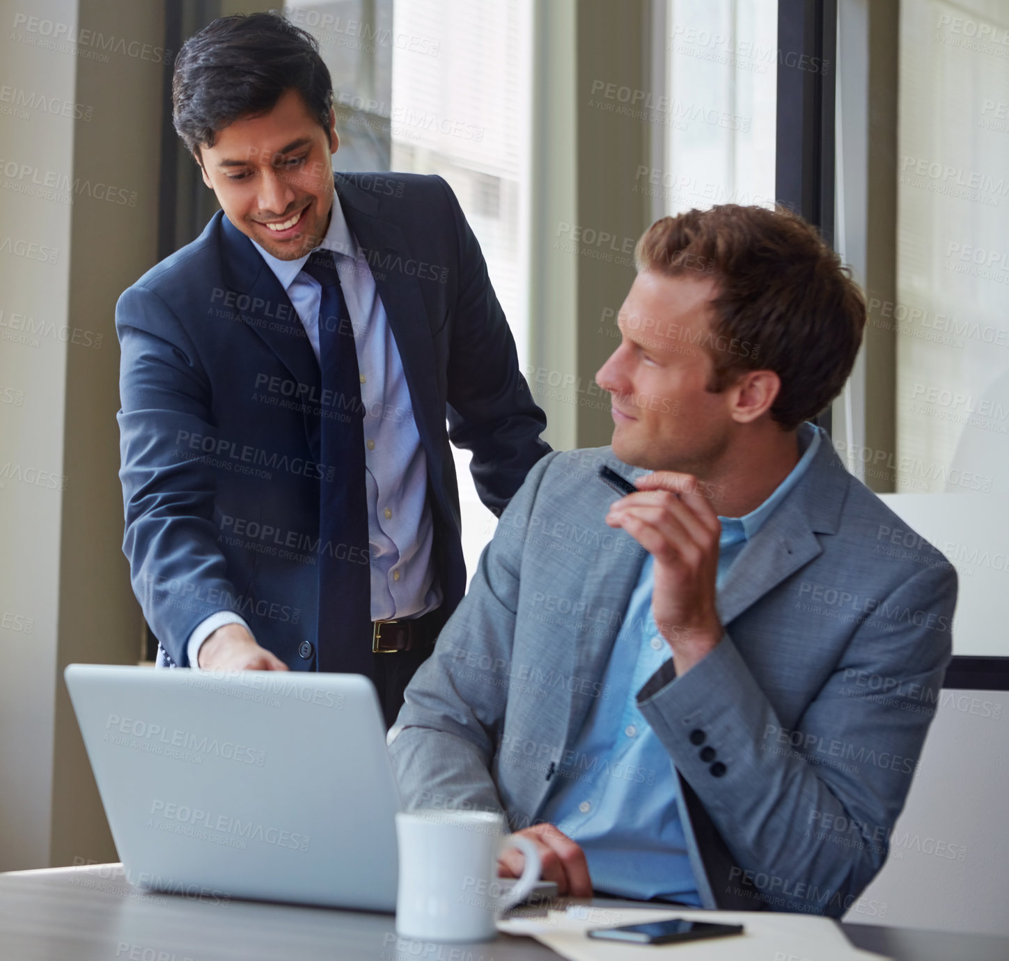 Buy stock photo Cropped shot of businessmen working in their office