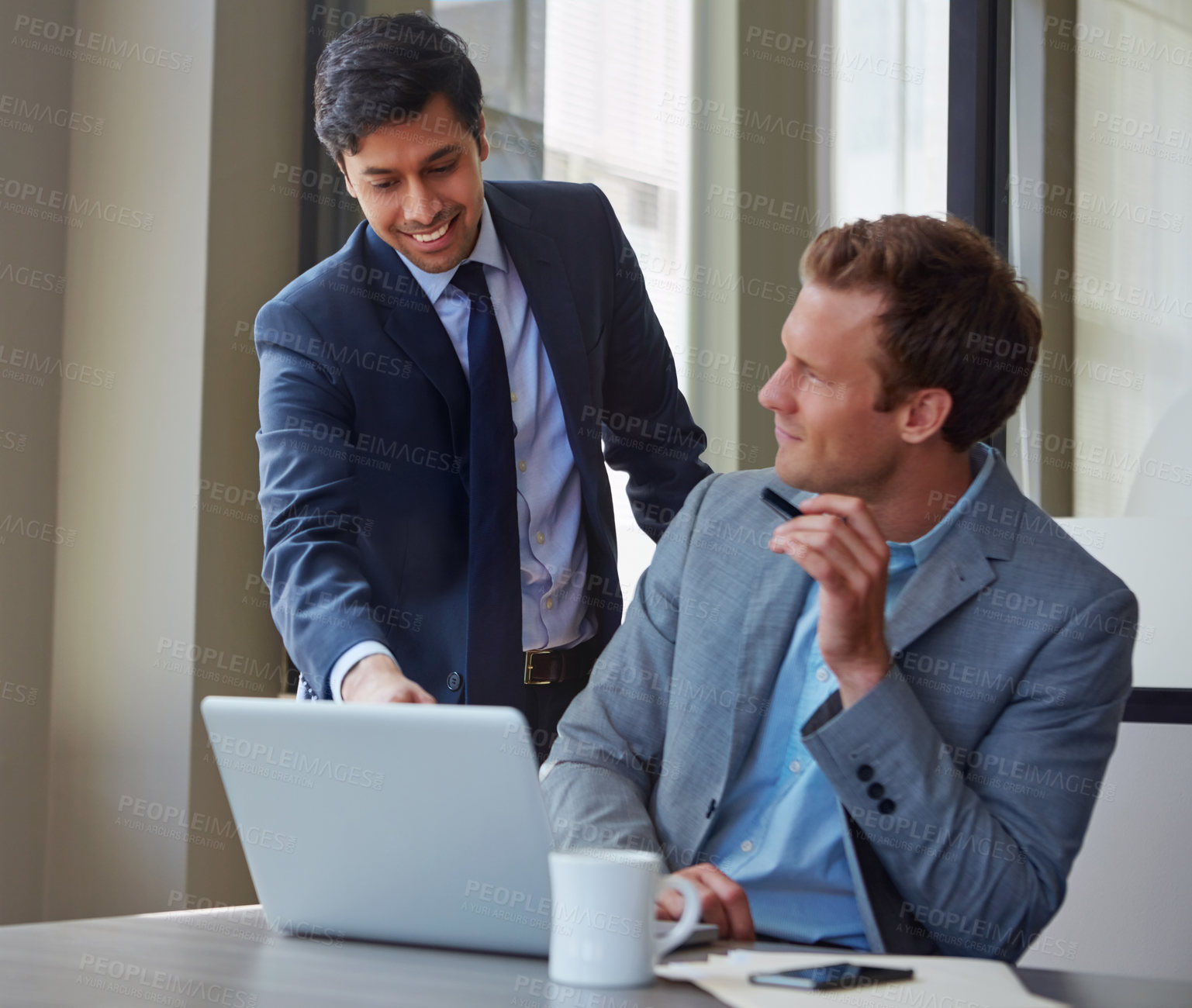 Buy stock photo Cropped shot of businessmen working in their office