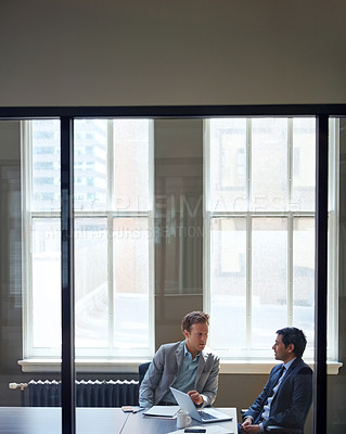 Buy stock photo Cropped shot of businessmen working in their office