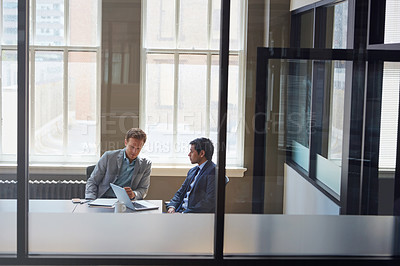 Buy stock photo Cropped shot of businessmen working in their office