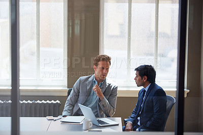 Buy stock photo Cropped shot of businessmen working in their office