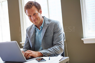 Buy stock photo Cropped portrait of a businessman working in his office