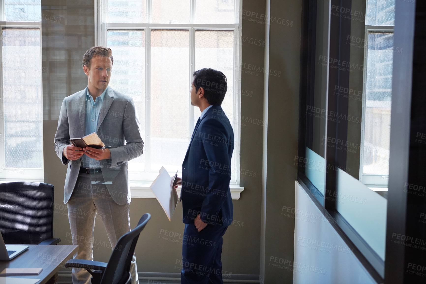 Buy stock photo Discussion, business men and notebook in meeting for auditing schedule, finance notes and agenda. Financial manager, assistant and paperwork in office for project management, admin tasks or feedback