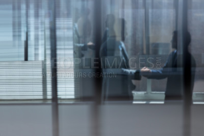 Buy stock photo Cropped shot of two businessmen shaking hands in the office