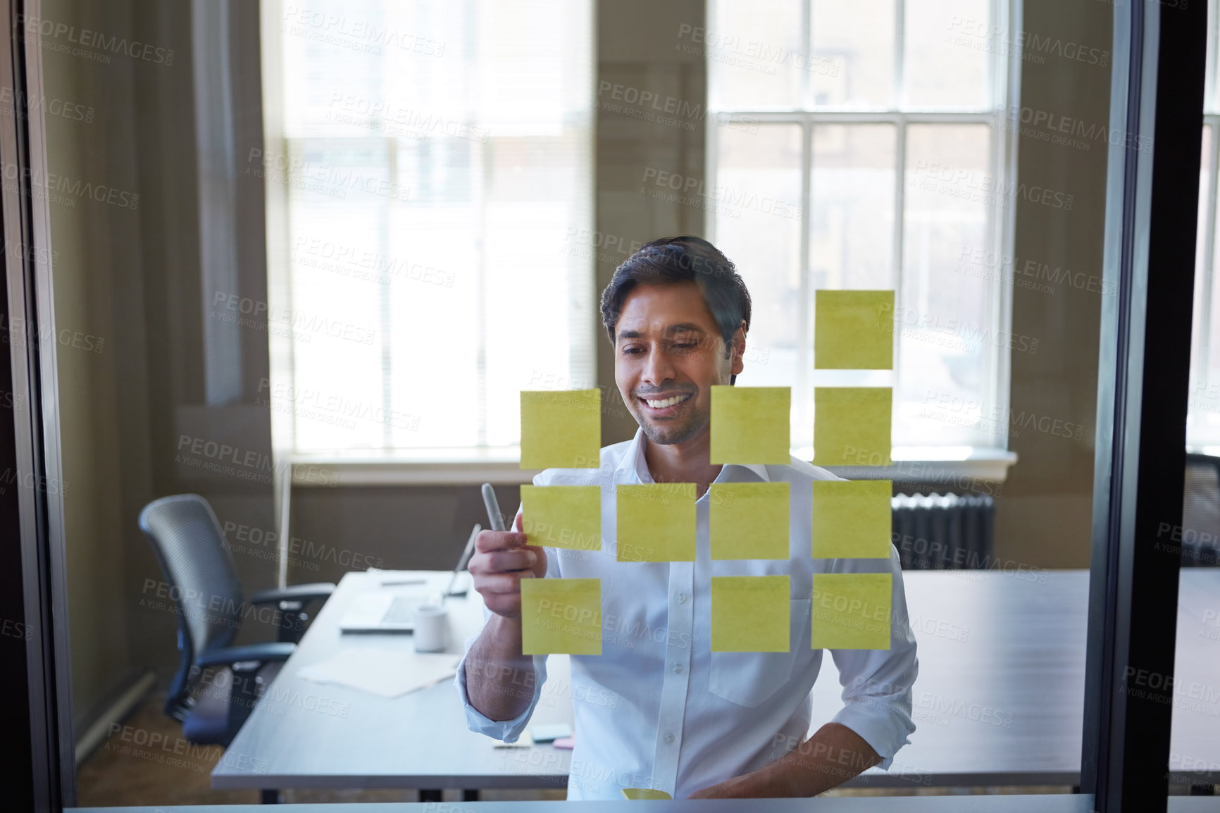Buy stock photo Business, man and reading sticky note in office for planning, schedule update and reminder. Glass, person and brainstorming with strategy, moodboard timeline and problem solving for proposal offer