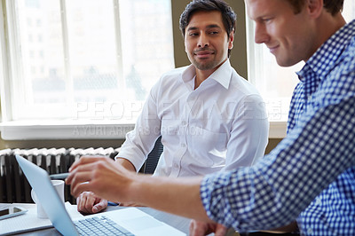 Buy stock photo Cropped shot of businessmen working in their office