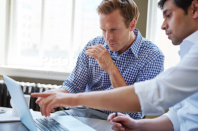 Buy stock photo Cropped shot of businessmen working in their office