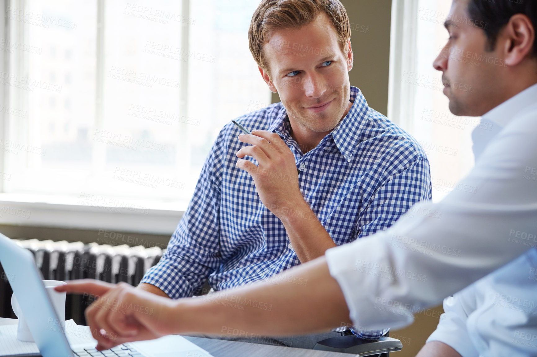 Buy stock photo Cropped shot of businessmen working in their office