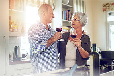 Buy stock photo Wine, toast or old couple hug in kitchen in celebration of marriage anniversary together in retirement at home. Cheers or senior woman drinking or bonding in a house with mature husband at dinner