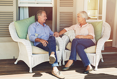 Buy stock photo Full length shot of a senior couple sitting outdoors