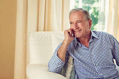 Buy stock photo Cropped shot of an elderly man sitting in a chair at home