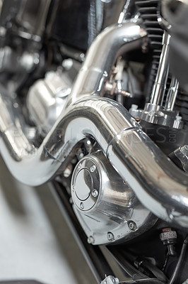 Buy stock photo Chrome plated bend exhaust outlet pipe of a modern motorbike. An engine block with the exhaust pipe of the latest motorcycle. Motorcycle engine clutch casing with shiny chrome parts closeup detail