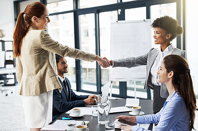 Buy stock photo Business woman, handshake and meeting with partnership for introduction, greeting or agreement at office. Happy group or employees shaking hands for deal, b2b or teamwork in boardroom at workplace