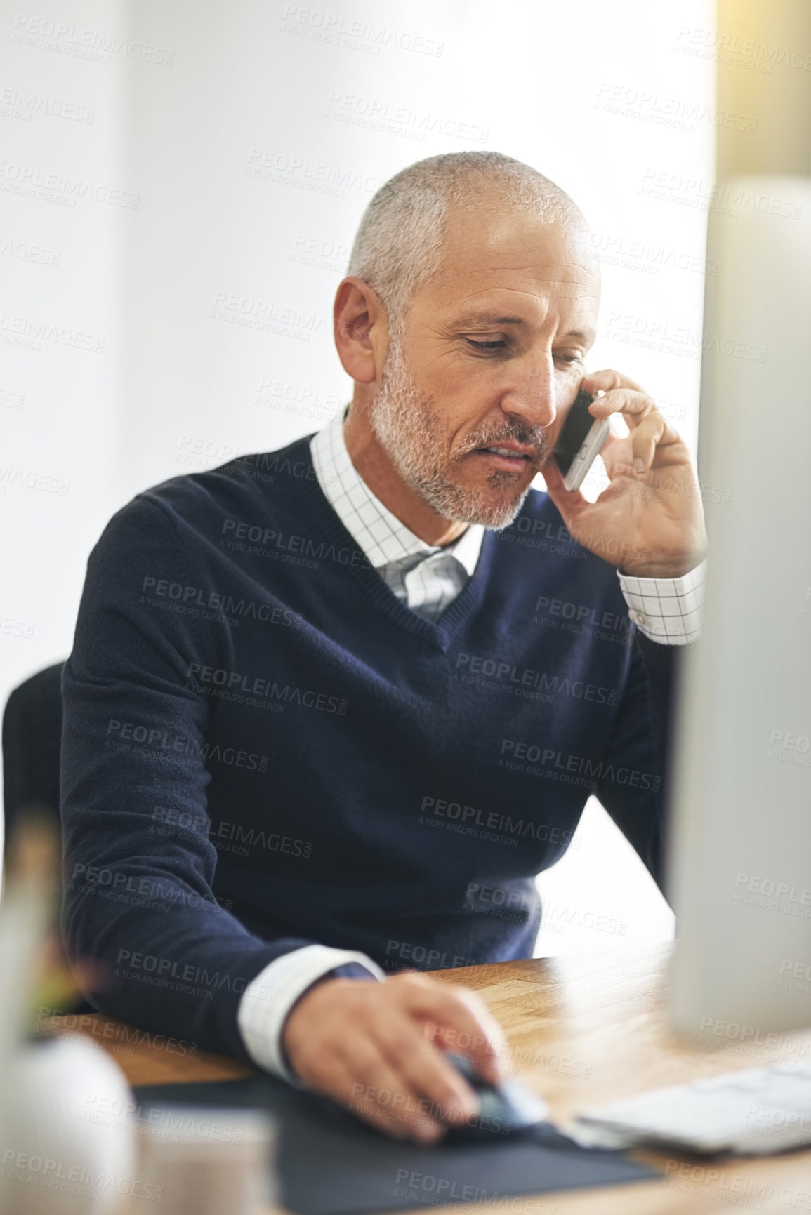 Buy stock photo Business, phone call and mature man with computer in office for crm, communication and b2b networking. Investment, advice and financial advisor with smartphone conversation online for trading help