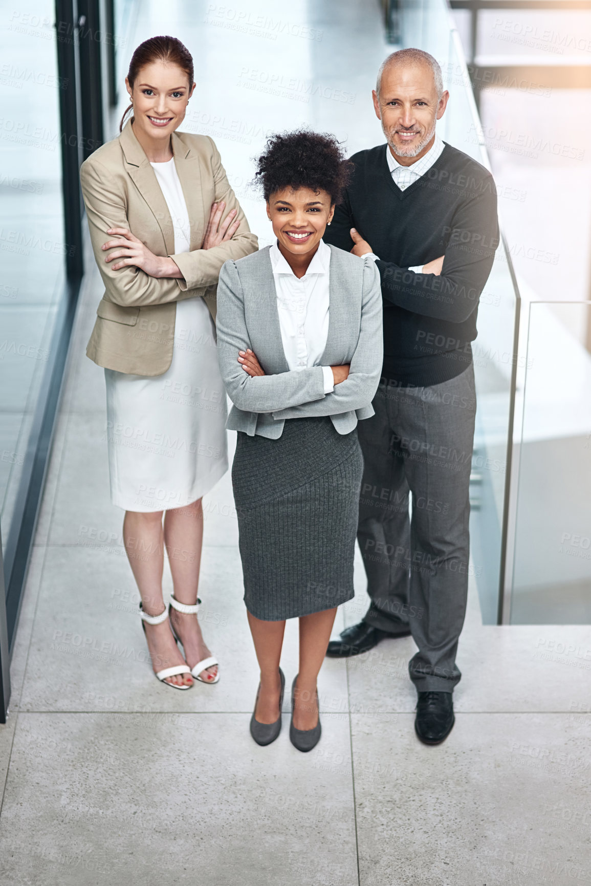 Buy stock photo Portrait, happy and confident group of business people together in office for cooperation, diversity or about us. Team, women and arms crossed for solidarity, smile or collaboration of agent manager