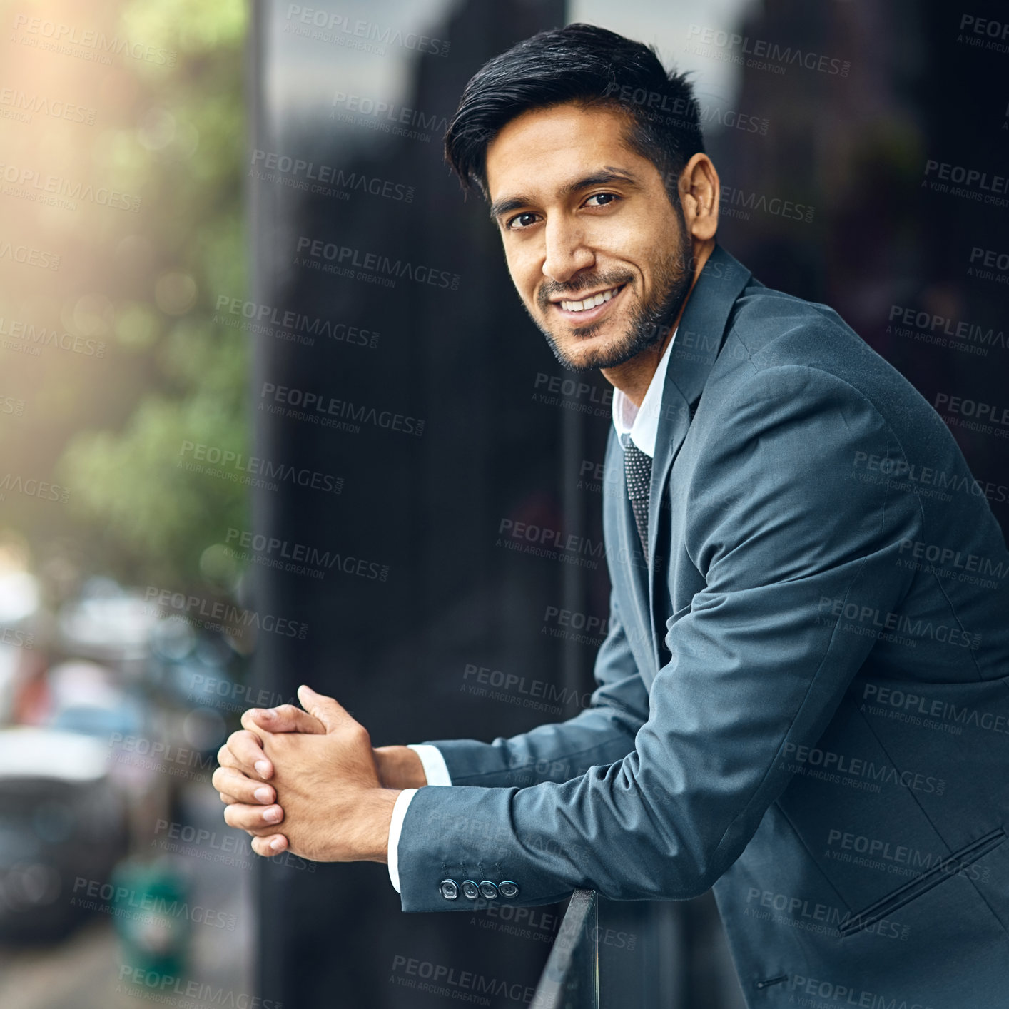 Buy stock photo City, confident and portrait of business man by building for working, career and job opportunity. Professional worker, corporate lawyer and face of person with smile, happy and company pride in India