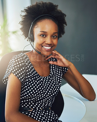 Buy stock photo Portrait of a support agent sitting in a modern office