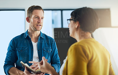 Buy stock photo Business people, notebook and meeting in office for discussion, research and collaboration with ideas. Coworking, notes and talking for communication, brainstorming and teamwork with project feedback