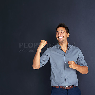Buy stock photo Mockup, happy man and winning fist in studio for success, victory or small business loan approval. Yes, hand and excited male entrepreneur celebrating good news or career milestone on grey background
