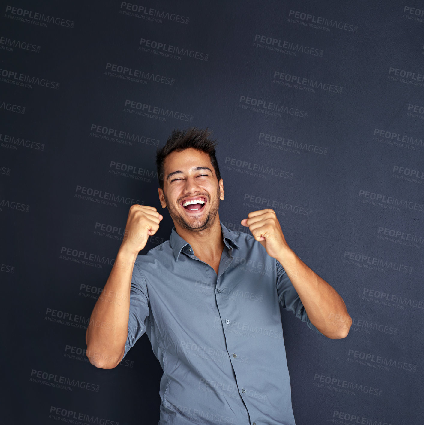 Buy stock photo Portrait, winning and man with fist in studio for success, victory or small business loan approval. Face, hand and male entrepreneur celebrating good news or career milestone on black background
